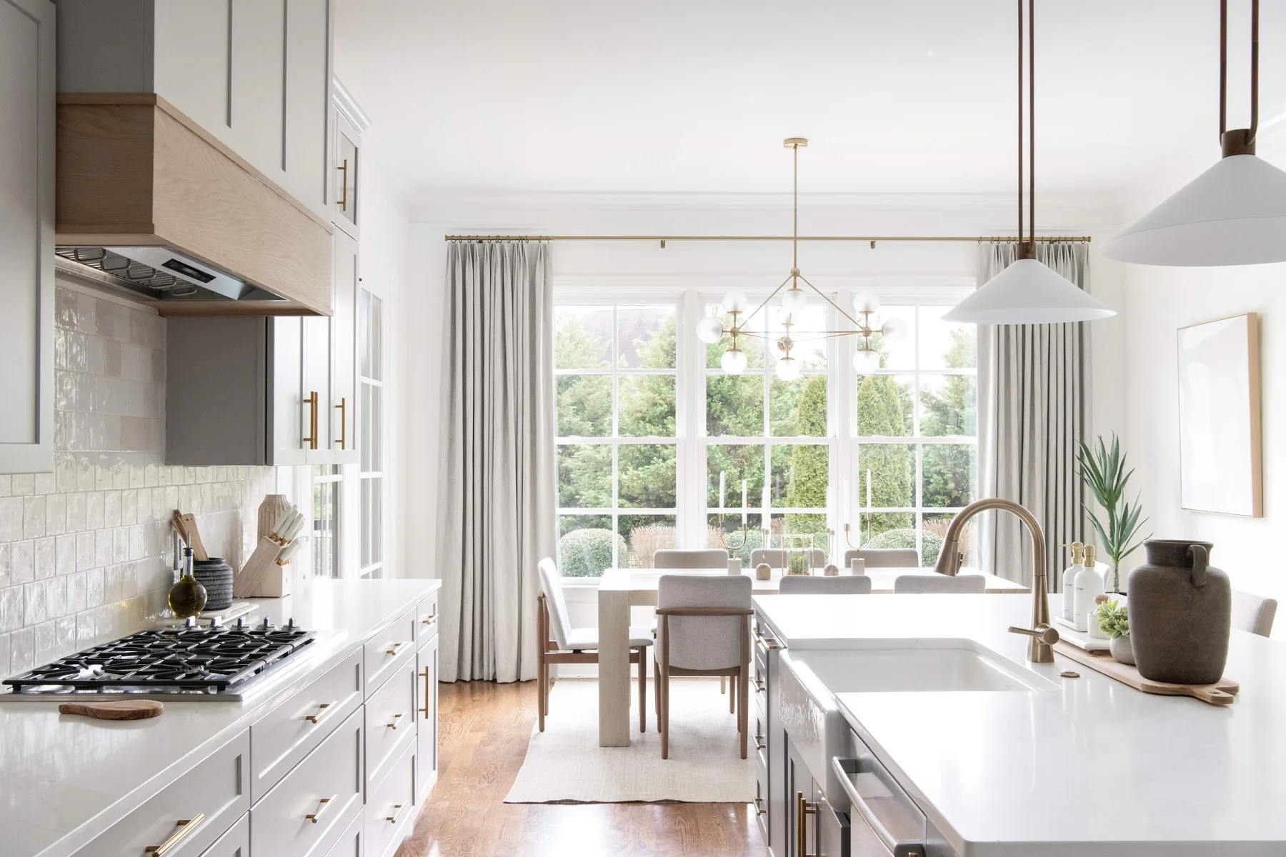 White kitchen with pendant lighting and breakfast nook, Almost Aussies project